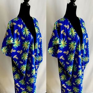 Multi-colored tunics/shrugs.